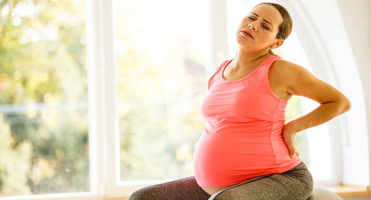 What Causes Backaches During Pregnancy?