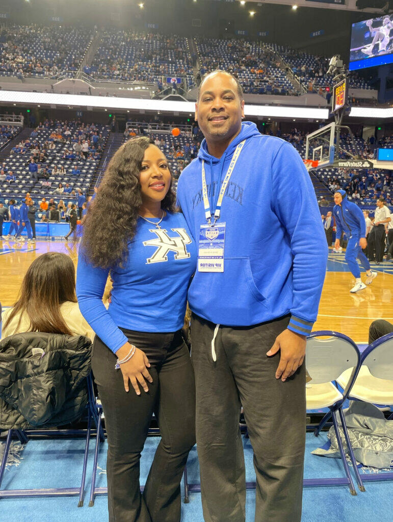 Jamie and Derek Anderson enjoying a game at the University of Kentucky, celebrating their shared love for sports and UK pride