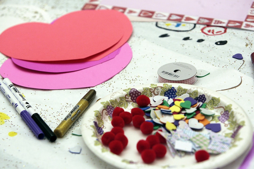 A well-organized craft station with colorful supplies like paper, paint, and glitter - Easy Valentine's Day Crafts the Whole Family Will Love A well-organized craft station with colorful supplies like paper, paint, and glitter - Easy Valentine's Day Crafts the Whole Family Will Love