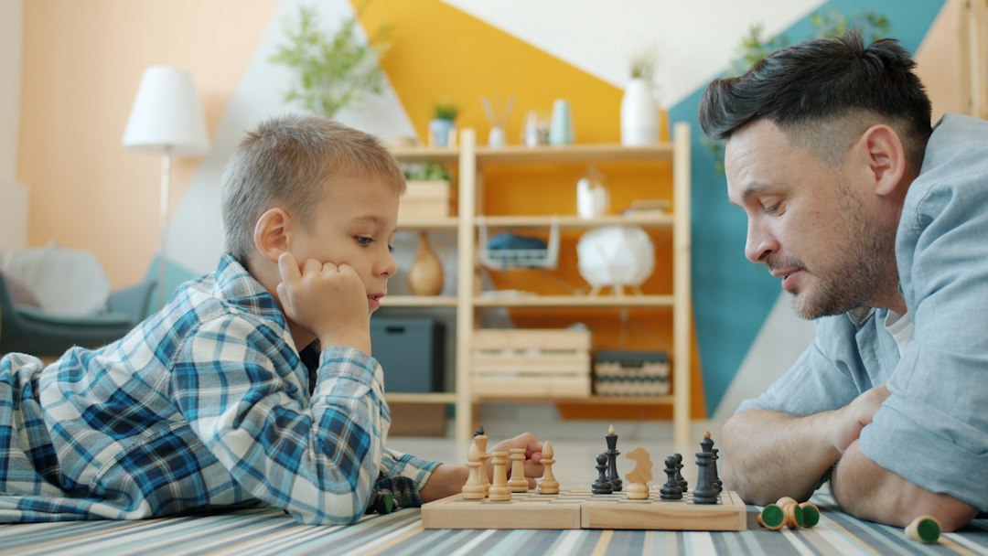 kids playing a board game kids playing a board game