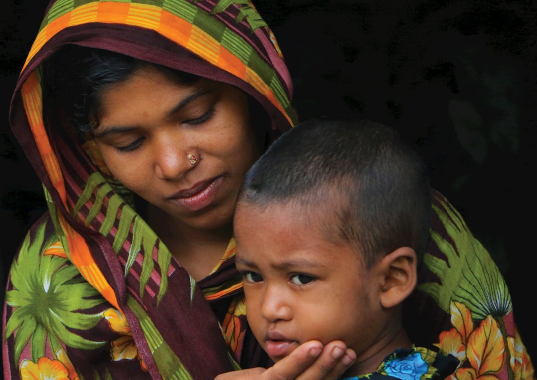 mother listening attentively to her child with warm eye contact