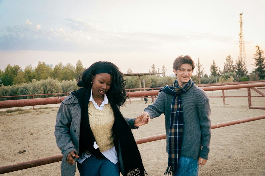 couple taking a relaxed walk outdoors couple taking a relaxed walk outdoors